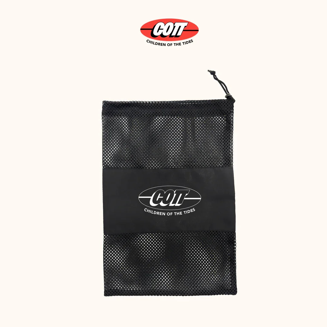 Black mesh surf accessory bag with COTT logo, ideal for storing wax, leashes, and gear.